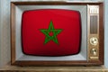 Old tube vintage TV with the national flag of morocco on the screen, the concept of eternal values Ã¢â¬â¹Ã¢â¬â¹on television, global